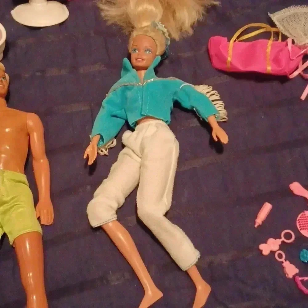 2 vintage Mattel Barbie dolls , one  Ken and one mini with extras